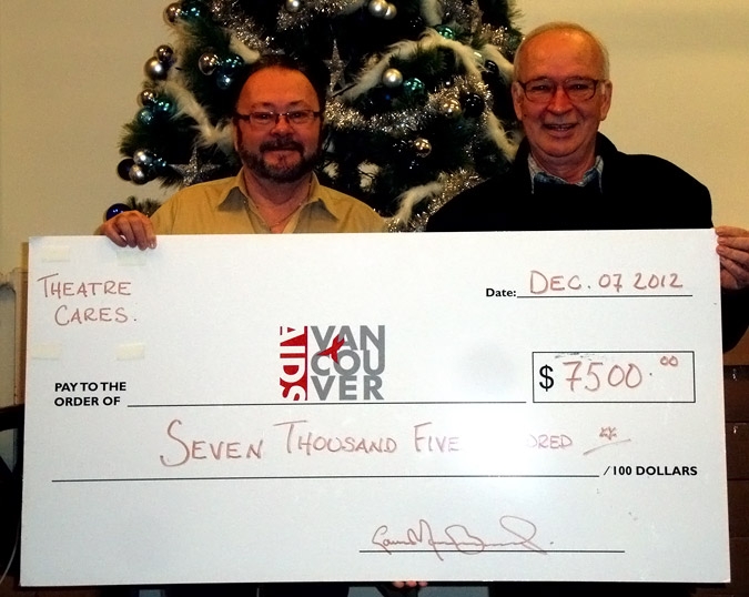 AIDS Vancouver Executive Director Brian Chittock accepts a $7500 cheque from Louis-Marie Bournival of Theatre Cares Vancouver.